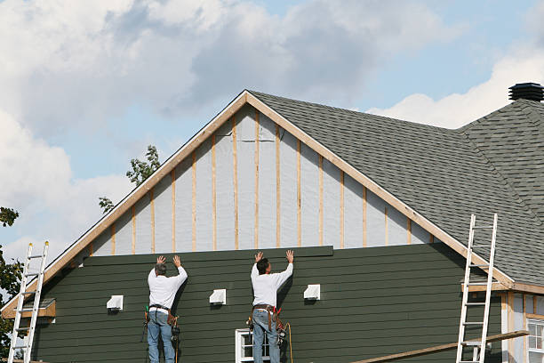Professional Siding Contractor technician working in Fairfax, VA